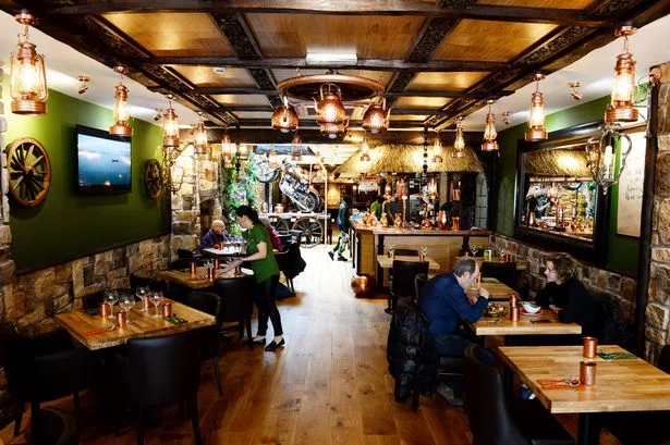 The dining room at Herb Restaurant Leicester set up for lunch service